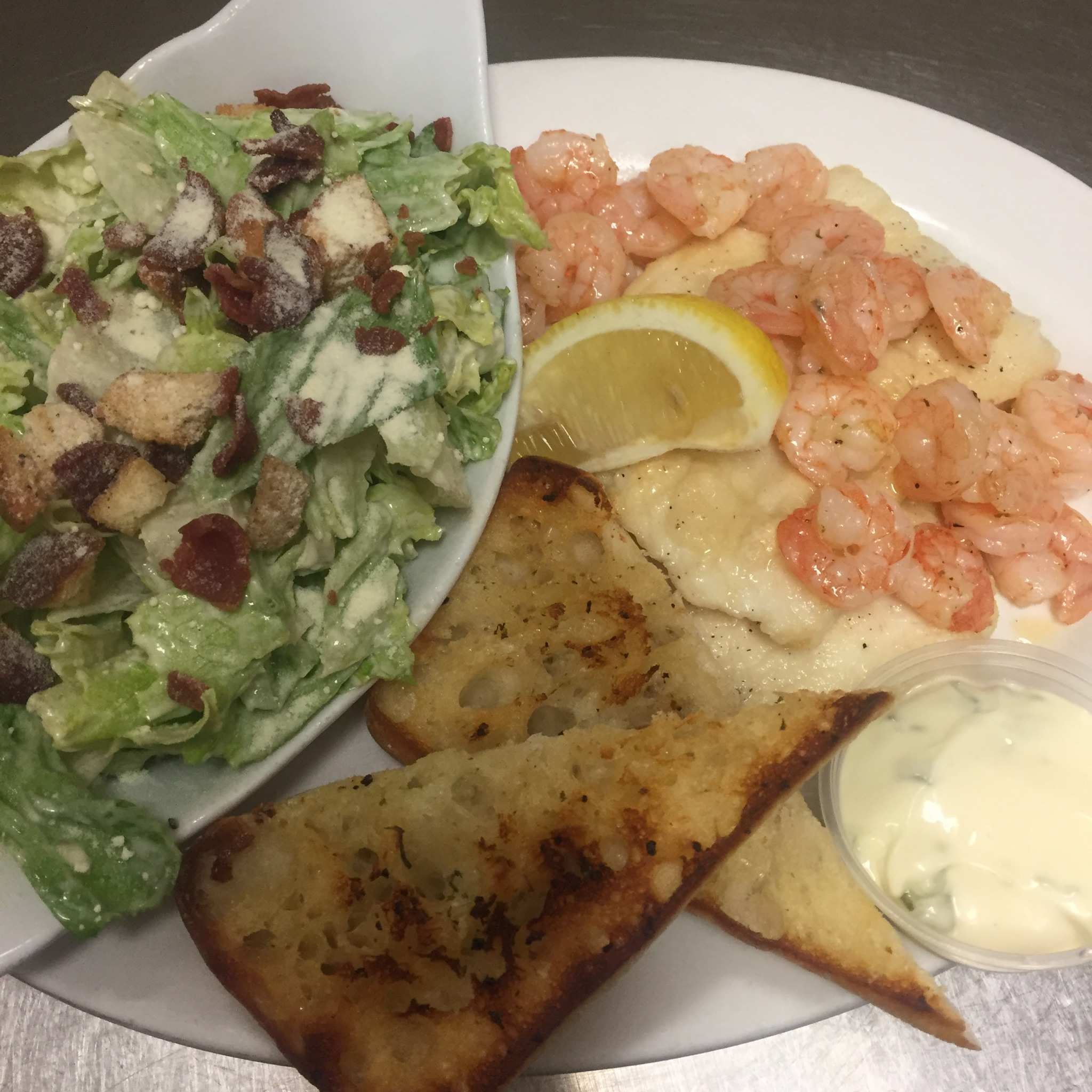 Picture of salad, shirmp and fish